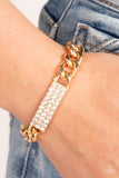 Icy Impact - Gold Paparazzi Bracelet All Eyes On U Jewelry